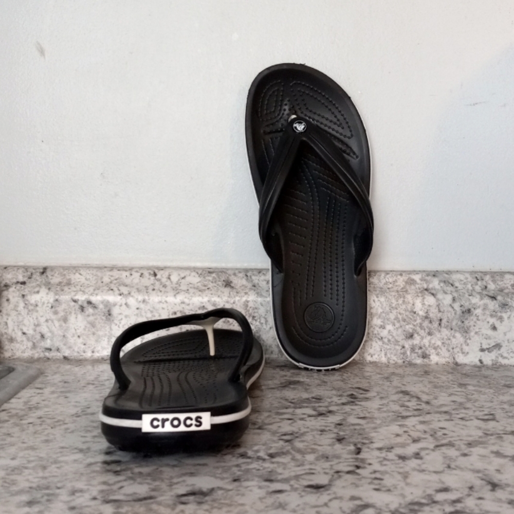 Black Crocs flip-flops